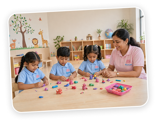 Manabi teacher helping children learn at classroom table in Sun City