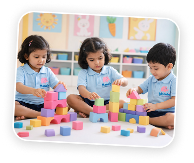 Young children building blocks at Manabi Early Learning Sun City